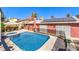 Backyard pool with spa and covered seating area at 4095 Ridgewood Ave, Las Vegas, NV 89120