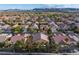 Wide aerial view of a residential neighborhood, showcasing the community's layout and surrounding landscape at 4314 Livorno Ave, Las Vegas, NV 89141