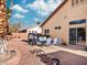 Backyard featuring stone gravel, a barbecue grill, and patio seating at 4314 Livorno Ave, Las Vegas, NV 89141
