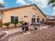 Spacious backyard featuring a barbecue grill and an outdoor dining area at 4314 Livorno Ave, Las Vegas, NV 89141