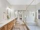 Luxurious bathroom with double vanity, walk-in shower, and modern finishes at 4314 Livorno Ave, Las Vegas, NV 89141