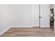 Spacious bedroom with hardwood floors and a closet at 4314 Livorno Ave, Las Vegas, NV 89141
