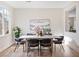 Bright dining room with modern chairs, a stylish table, and a view to the outside at 4314 Livorno Ave, Las Vegas, NV 89141