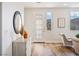 Inviting entryway with stylish decor, wood-look flooring, and plenty of natural light at 4314 Livorno Ave, Las Vegas, NV 89141