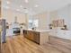 Spacious kitchen featuring stainless appliances, a large island, and open access to living areas at 4314 Livorno Ave, Las Vegas, NV 89141
