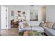 Cozy living room featuring modern furnishings, wood floors, and decor at 4314 Livorno Ave, Las Vegas, NV 89141