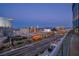 Stunning city view from a private balcony, showcasing skyscrapers and a dynamic urban landscape at dusk at 4525 Dean Martin Dr # 2503, Las Vegas, NV 89103