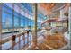 Spacious living area with floor-to-ceiling windows, sculptural staircase, and luxurious finishes at 4525 Dean Martin Dr # 2503, Las Vegas, NV 89103