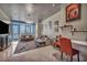 Bright living room showcasing a large window with great views and sleek modern furnishings at 4525 Dean Martin Dr # 2503, Las Vegas, NV 89103