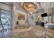 Modern main bathroom featuring a luxurious tub, unique mosaic artwork, and elegant lighting at 4525 Dean Martin Dr # 2503, Las Vegas, NV 89103