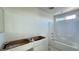 Bathroom featuring new tub, shower, and vanity installation at 4684 Parkarbor Ave, Las Vegas, NV 89141