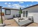 Cozy backyard patio with outdoor seating, perfect for relaxing and entertaining at 4981 E Pawnee Pl, Pahrump, NV 89061