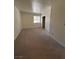 Cozy bedroom featuring plush carpeting, a bright window, and closet space at 5251 Indian River Dr # 271, Las Vegas, NV 89103