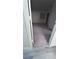 Carpeted bedroom features a window and neutral color scheme at 5251 Indian River Dr # 271, Las Vegas, NV 89103
