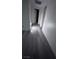 Hallway features contemporary flooring and leads to multiple rooms at 5251 Indian River Dr # 271, Las Vegas, NV 89103