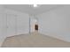 Bedroom features new carpet, ample closet space, and access to a bathroom at 5653 Mount Athos St, North Las Vegas, NV 89031