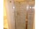 Bathroom with a tiled shower featuring a glass door enclosure at 5751 E Hacienda Ave # 137, Las Vegas, NV 89122