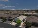 Aerial view of the property with the Las Vegas Strip in the distance at 5936 Bruselas Street at 5936 Bruselas St, Las Vegas, NV 89113