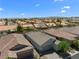 Expansive aerial view showcasing the neighborhood and surrounding landscape at 5936 Bruselas St, Las Vegas, NV 89113