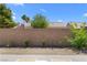 Backyard with desert landscape and block wall for privacy at 5936 Bruselas St, Las Vegas, NV 89113