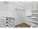 Organized walk-in closet with efficient shelving and drawer systems, providing maximum storage capacity at 5936 Bruselas St, Las Vegas, NV 89113