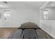 A modern dining room with wood floors, light walls, and an area rug at 5936 Bruselas St, Las Vegas, NV 89113