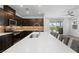 Modern kitchen featuring an oversized island, stainless steel appliances, and ample cabinet space at 5936 Bruselas St, Las Vegas, NV 89113