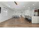 Open floor plan with kitchen and dining area featuring wood floors at 5936 Bruselas St, Las Vegas, NV 89113