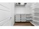 Organized walk-in closet with shelving, drawers, and hanging space at 5936 Bruselas St, Las Vegas, NV 89113