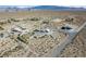 Distant aerial view with other residences and desert landscape at 5950 Mojave St, Pahrump, NV 89061