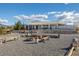 Spacious backyard offering multiple seating areas and a desert landscape, perfect for outdoor entertaining and relaxation at 5950 Mojave St, Pahrump, NV 89061