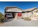This property features a covered carport with a truck parked under it and a storage shed at 5950 Mojave St, Pahrump, NV 89061