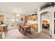Open dining area with access to a kitchen and outdoor patio at 5950 Mojave St, Pahrump, NV 89061