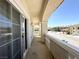 Covered balcony with decorative balustrade providing nice views of the neighborhood at 6571 Abalone Shell Ct, Las Vegas, NV 89139