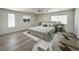 Comfortable bedroom with ample natural light, complemented by stylish furnishings, soft carpet, and a calm atmosphere at 6571 Abalone Shell Ct, Las Vegas, NV 89139