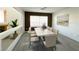 Bright dining room showcasing a marble-top dining table and stylish decor at 6571 Abalone Shell Ct, Las Vegas, NV 89139
