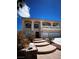 Front exterior of a two-story home with steps leading to the front door and a well manicured yard at 6571 Abalone Shell Ct, Las Vegas, NV 89139