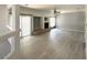 Spacious living area featuring sleek flooring and a cozy fireplace at 6571 Abalone Shell Ct, Las Vegas, NV 89139