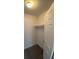 Walk-in closet with carpeted floor, shelving, and white door at 6800 E Lake Mead Blvd # 2024, Las Vegas, NV 89156