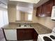 Cozy kitchen with granite countertops and a view of the living room at 6800 E Lake Mead Blvd # 2024, Las Vegas, NV 89156