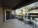 Relax on this private balcony featuring black railings and sliding glass doors leading inside, perfect for enjoying fresh air at 6868 Sky Pointe Dr # 1118, Las Vegas, NV 89131