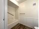Bright bathroom featuring a shower-tub combination with tile surround and grab bar at 6868 Sky Pointe Dr # 1118, Las Vegas, NV 89131