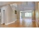 Spacious living room with tile flooring, high ceilings, and natural light perfect for comfortable living at 72 Broken Putter Way, Las Vegas, NV 89148