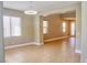 Bright living room with tile flooring, neutral walls, and ample natural light for a comfortable atmosphere at 72 Broken Putter Way, Las Vegas, NV 89148