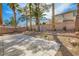 Backyard featuring a concrete patio and mature trees at 7547 Rolling River Dr, Las Vegas, NV 89131