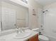 Bathroom featuring a vanity with sink, a mirror and a shower-tub combo at 7825 White Grass Ave, Las Vegas, NV 89131