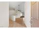 Welcoming home foyer with tile flooring and a view into the living area at 7825 White Grass Ave, Las Vegas, NV 89131