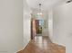 Inviting home foyer with tile flooring and a view of the front yard at 7825 White Grass Ave, Las Vegas, NV 89131