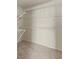 Spacious walk-in closet featuring wall-to-wall metal shelving for maximum storage and organization at 7825 White Grass Ave, Las Vegas, NV 89131