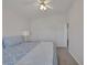 Inviting bedroom with a ceiling fan, soft lighting, and neutral décor at 7849 Meandering Light Ave, Las Vegas, NV 89131